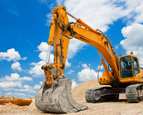 Yellow Excavator at Construction Site