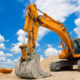 Yellow Excavator at Construction Site