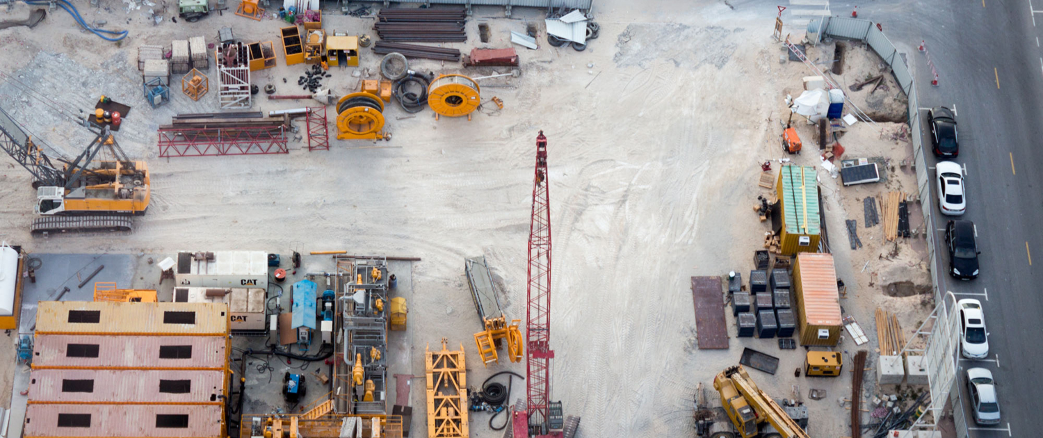 Aerial shot of a big urban construction site, industry and architecture concepts