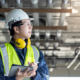 Building inspector man using digital tablet checking plumbing pipeline system
