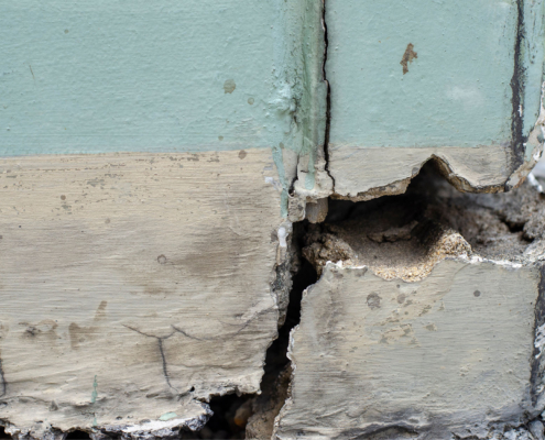 Close up Cracked concrete building or pillar cement wall