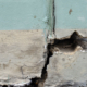 Close up Cracked concrete building or pillar cement wall